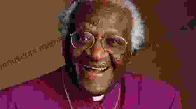 A Photo Of Desmond Tutu Smiling And Holding A Child Desmond Tutu Quotes: 55+ Inspiring Thoughts Quotations By Desmond Tutu Who Endeavors To Make The World A Better Place